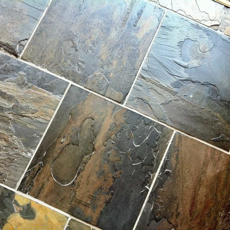 Close-up of natural slate stone tiles for durable flooring.